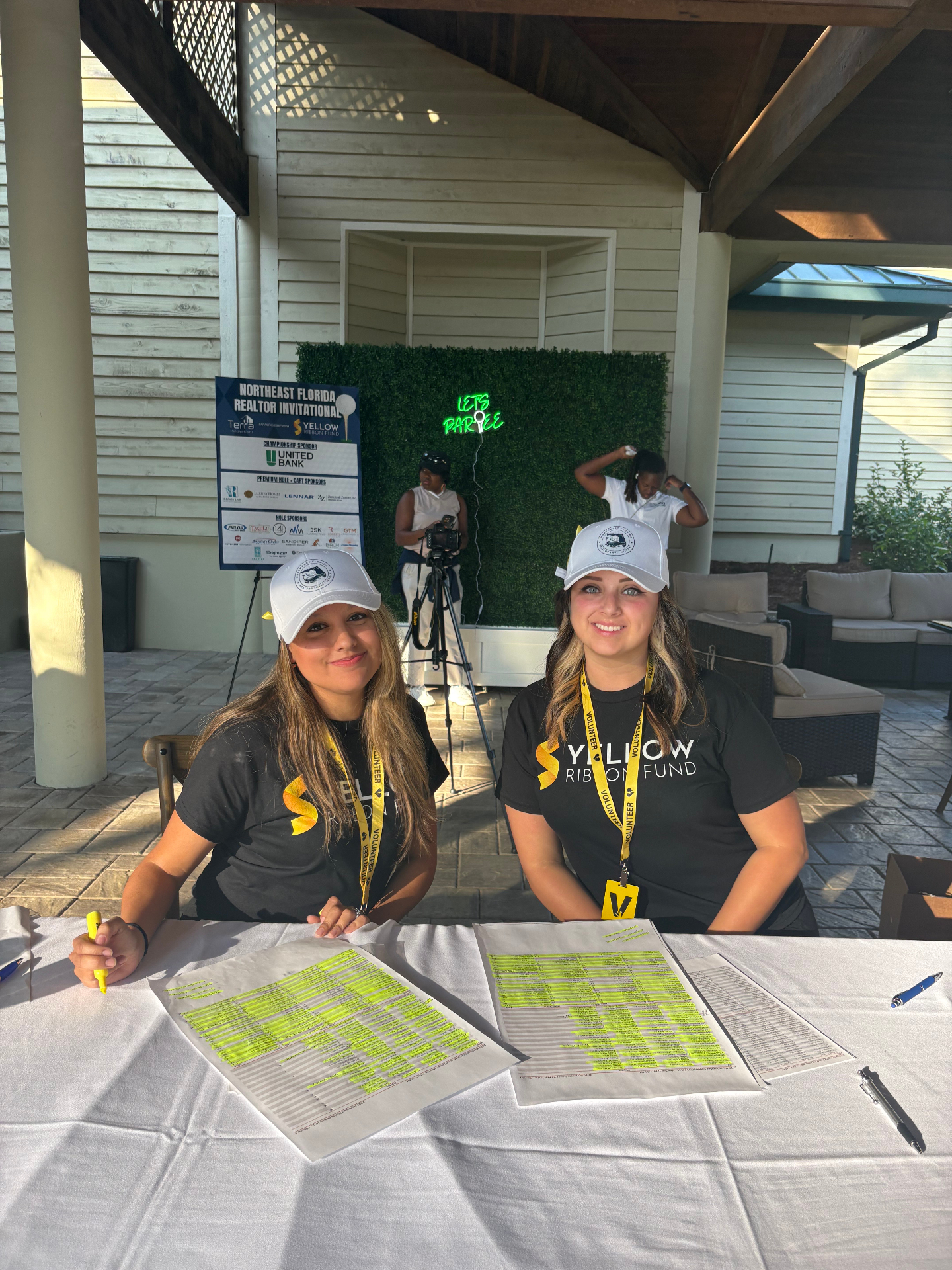 Yellow Ribbon Fund volunteers at player check-in
