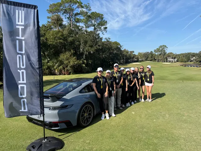 Team posing with the Porsche hole-in-one car